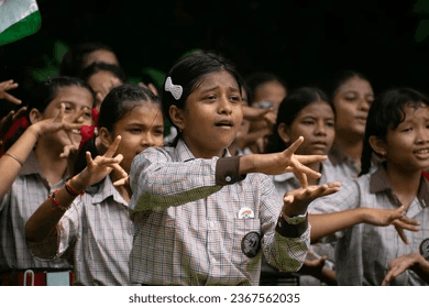 Group of deaf school children signing together